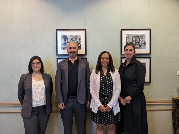 Ms. Elham Tabassi, Mr. Sultan Meghji, Ms. Nykia Wilson, and Ms. Meg Poole gather before a Tech Envoy Series program at Meridian House in Washington, DC on July 14, 2023. Photo by Jessica Hill.
