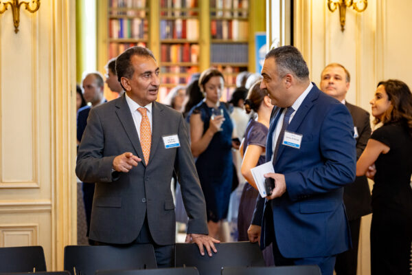 His Excellency Nazar Al Khirullah, Ambassador of the Republic of Iraq, and Ammar Al Dabagh, Chief of Protocol at the Embassy of the Republic of Iraq, talk before an Insights@Meridian program at Meridian House in Washington, D.C. on July 26, 2023. Photo by Jess Latos.