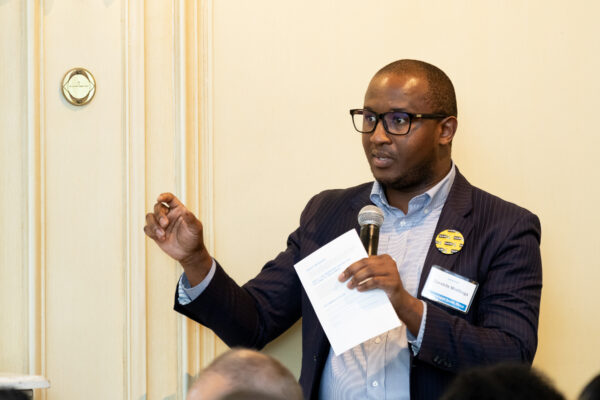 Oarabile Motlhaga, Economic and Social Second Secretary at the Embassy of the Republic of South Africa, asks a question during an Insights@Meridian program at Meridian House in Washington, D.C. on July 26, 2023. Photo by Jess Latos. 