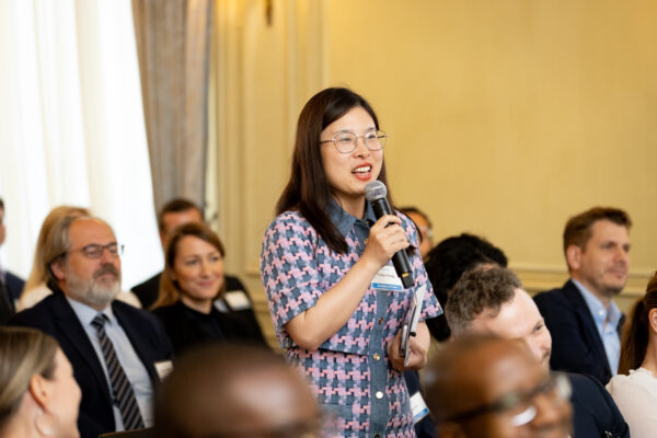 Yutian Peng, Third Secretary of Economy and Commerce at the Embassy of the People’s Republic of China, asks a question during an Insights@Meridian program at Meridian House in Washington, D.C. on July 26, 2023. Photo by Jess Latos. 